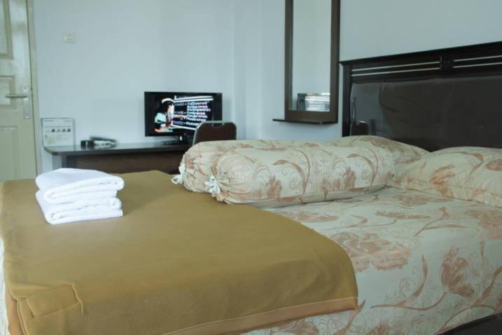 Wisma Hm Jhoni Hotel